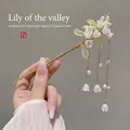 Handmade lily of the valley hair stick with white flowers and golden tassels - New Lily of the Valley Tassel