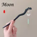 Classic wooden hairpin with a crescent moon pendant and green teardrop bead - Black Hair Stick Moon Pendant