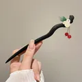 Minimalist ebony wood hair stick with green leaves and red cherry fruit pendant - Green Leaf Rabbit Tassel Red Bead