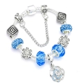 Silver charm bracelet with blue crystal beads and a rose flower pendant charm - 16cm / Blue
