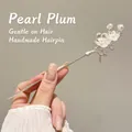 Silver plum blossom hair stick with white pearls in a hand-held elegant view - Artificial Pearl Plum Blossom Style (63#) / Silver