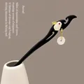 Minimalist sandalwood hairpin with white rabbit charm and delicate metal chain tassel - 48# White Jade Hollow Circular Pendant Rabbit Hairpin