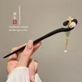 Handcrafted ebony wood hair pin featuring a white jade rabbit and elegant metal tassels - 16# Jade Rabbit Yellow Flower Tassel
