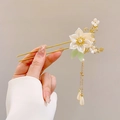 Elegant Chinese hair stick with white petals, green leaves and gold double tassels - 13# White Lotus Pearl Tassel Style