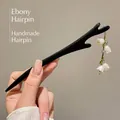 Sandalwood hair pin with stag horn design and lily of the valley floral tassel detail - 14# Branch Wind Chime Pearl Style