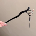 Elegant black wood hair stick featuring translucent butterfly with Chinese calligraphy - Water Drop Butterfly Style