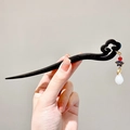Modern ebony wood hair pin with blue enamel petals and white drop bead pendant - Misty Orchid Style