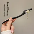 Modern ebony hair stick with a white shell flower and a golden pearl pendant drop - Pearl Flower Pearl Pendant (50#)