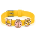 Yellow silicone bracelet featuring rose gold charms with cat head, ladybug, and paw print - Cat Ladybug Paw (034)
