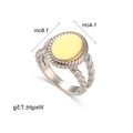 Retro stainless steel rope ring featuring a golden oval face and twisted silver band - Gold and Silver Two-tone