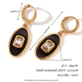 Edelstahl-Ohrringe mit 18K Goldbeschichtung, schwarzer Emaille und Zirkonia-Anhänger - Ovale gedrehte Emaille Zirkonia Creolen - Gold Schwarz
