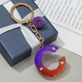 Letter C keychain with purple and orange gradient resin, gold stars and fluffy pompom - Letter C