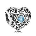 Silver heart charm with intricate filigree patterns and a faceted blue gemstone - Blue Gemstone Hollow Heart Pendant (030)