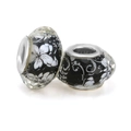 Faceted glass charm beads with black and white floral patterns and silver core rings - Black White Faceted Floral Pattern (026)