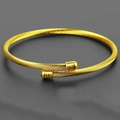 Minimalist gold cable twist bangle with a spiral texture and cylindrical capped ends - Gold