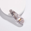 Detailed close-up of marble pattern acetate hair clip with golden metal fastener - Gray Water Drop Style (H02_3)
