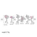Detailed view of six 18K steel navel rings with pink zircon in various shapes - Piercing Set (G047_5) / 12-16mm / Silver