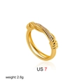 Detail view of 18K gold knotted ring with zircon inlay showing US size 7 and 2.8g weight - US 7 / Cross Knot Zirconia Style