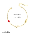 Detailed view of 18K gold plated chain with red heart and U charms showing 28cm length - Infinity Heart Style
