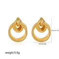 Close-up of 18K gold intertwined circle earrings with 20mm height and weight dimensions - 3D Triple Hoop Style / Standard / Gold