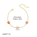 Detailed view of 18K gold chain with food charms, lobster clasp and dimensions info - Lollipop Style