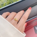 18K gold-plated titanium ring with round Fu character pendant worn in a luxury car - US 6 / Gold