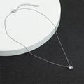 Minimalist silver-toned necklace featuring a square zircon pendant and 18k rose gold plating - Single Stone Four-Claw Necklace / Silver