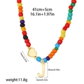 Detail view of rainbow beaded necklace with golden heart and letter J pendant charms - Style J(T1506_10)
