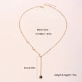 Detail of 14K gold-plated star Y-necklace with black star pendant and size dimensions - Pentagram Pendant Necklace (XL045)