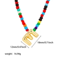 Collana di perline arcobaleno in acciaio placcato oro 18K con ciondolo lettera E dorata - Perline di Riso Colorate E