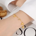 Elegantes goldenes Muschelarmband mit weißen Zirkonia im böhmischen Kettenstil - Muschel Zirkonia Anhänger Stil / Gold