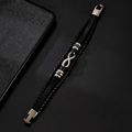 Men's black braided leather bracelet featuring a silver infinity charm and metal clasp - Black
