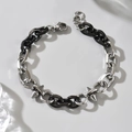 Bracciale punk con maglie argentate, anelli neri e due ciondoli a punta metallica - Stile a Punta Contrasto Nero Argento (GS1818B)