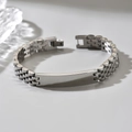 Bracciale da uomo in acciaio al titanio con piastra liscia incisibile in argento - Argento