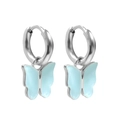 Detail of silver hoop earrings with translucent light blue butterfly pendants on white - 18K Gold / Blue Silver