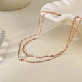 Dubbellaagse roségouden titanium enkelband met ronde zirkonia en platte paillettenketting - Roségoud (GZ110M)
