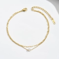 Dubbellaagse gouden roestvrijstalen enkelband met zirkonia bedel en platte slangenketting - Goud (GZ110J)