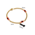Bracelet acier inoxydable doré 18k avec perles orange et pendentif poing noir - 16cm / Or
