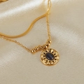 Close-up of double-layer gold snake chain necklace with sunburst stone pendant on silk - Double Layer Sunburst Cat's Eye Pendant (GX2445) / Gold
