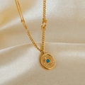 Detail of double-layer gold necklace with sunburst pendant and blue stone on silk - Double Layer Sunburst Blue Stone Pendant (GX2443) / Gold