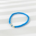 Himmelblaues Heishi-Perlenarmband mit Evil Eye Anhänger und goldenen Akzenten - Marquise Auge Dunkelblau