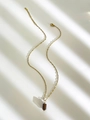 Golden stainless steel necklace with a brown tiger eye stone cylindrical pendant - Tiger Eye