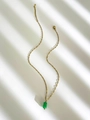 Golden necklace featuring a vibrant green cylindrical natural stone pendant - Green Agate