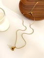 Detailed view of gold stainless steel necklace with sunburst tiger eye pendant - Gold Tiger's Eye