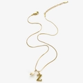 Collana dorata in acciaio inossidabile con ciondolo lettera Z e piccola perla - Collana Lettera Z