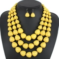 Kleurrijke gelaagde kralenketting en oorbellen set in helder geel design - Geel