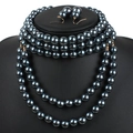 Detail of elegant multi-layer dark grey faux pearl necklace set and matching earrings - Multi-layer Beaded Jewelry Set / Gun Black