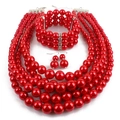 Dreiteiliges Set mit roten mehrlagigen Perlenketten, Armband und Ohrringen - Rot