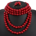 Elegant red multi-layer faux pearl necklace and earring set on a black display bust - Multi-layer Beaded Jewelry Set / Red
