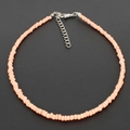 Bohemian style beaded choker necklace with light orange salmon beads and silver clasp - Hot Pink